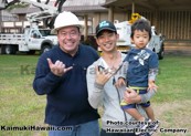 Todd_Mayeshiro, a construction project manager at Hawaiian Electric,
with Jake Shimabukuro.
